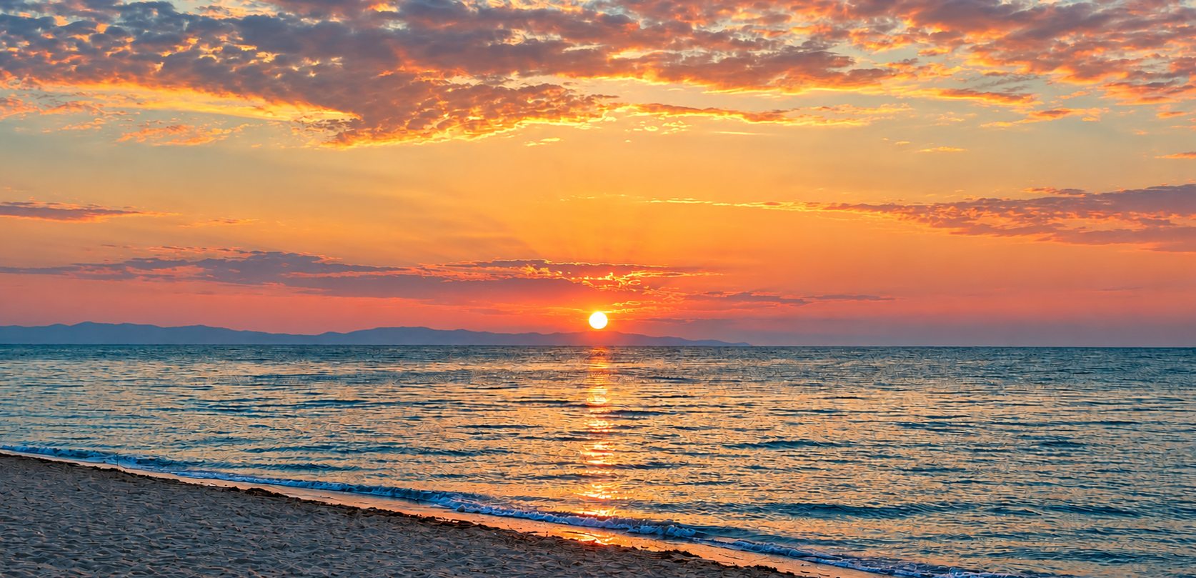 Sunrise over the sea at Olympic Beach, Pieria.